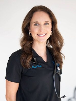 Dr. Megan Ricord - female veterinarian with long brown hair wearing a black a black v-neck tshirt